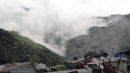 Cloud playing hide and seek in the Darjeeling town