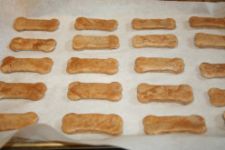 Baking homemade dog training treats, peanut butter biscuits, with your children!