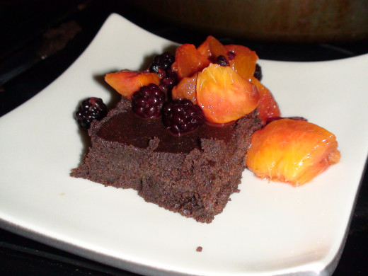 Chocolate Avocado Brownies topped with blackberries and peaches. Delicious!