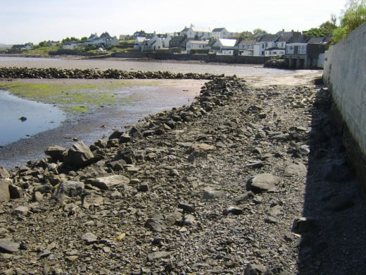 Bowmore Harbour beach at low tide