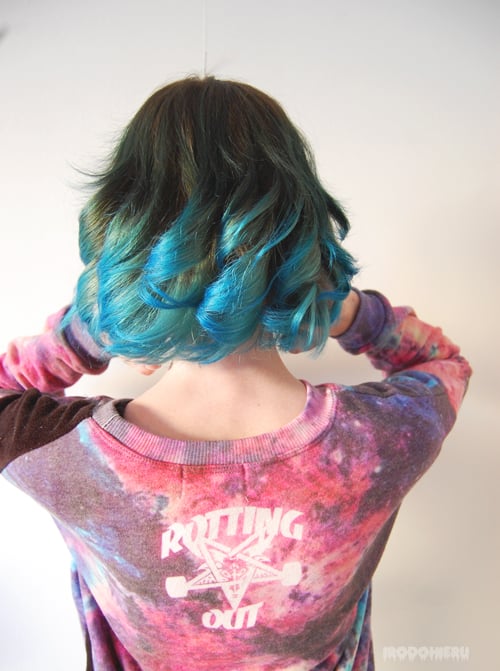 You can see here how the tips of the hair have been lightened to take the blue dye!