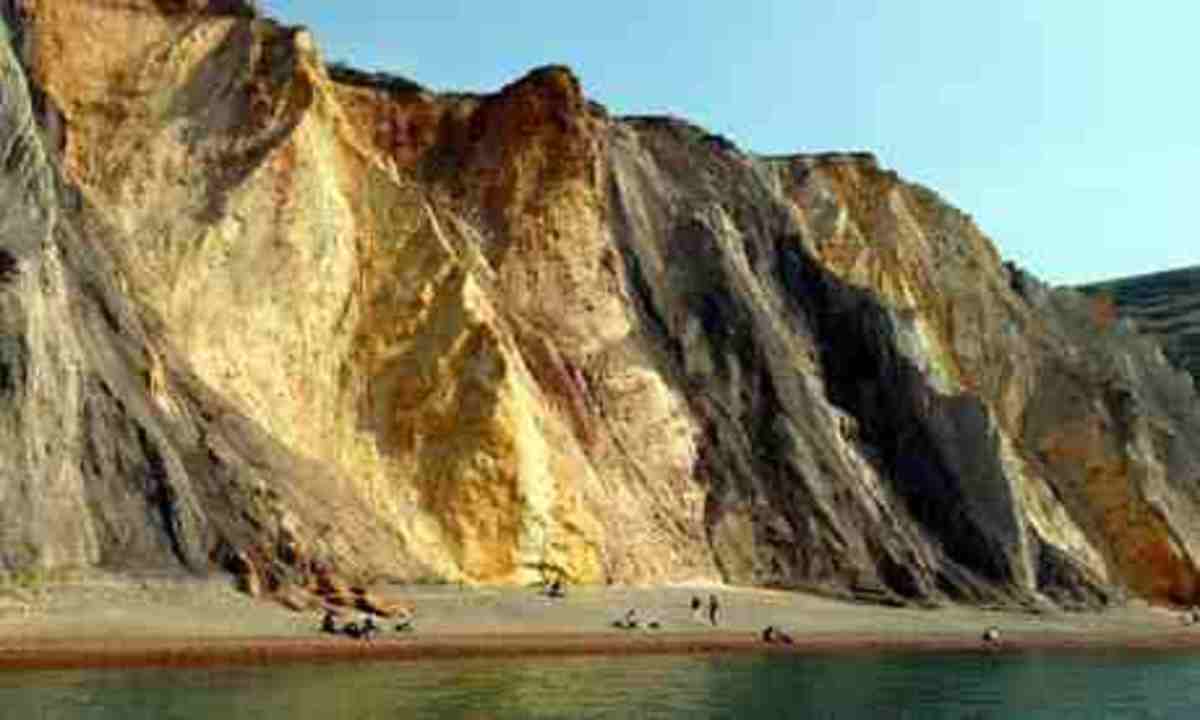Multi colored sand cliffs.