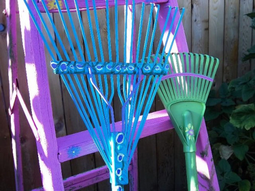 Create color pops in your garden with colorful lawn rakes.