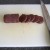 Slicing black pudding for frying
