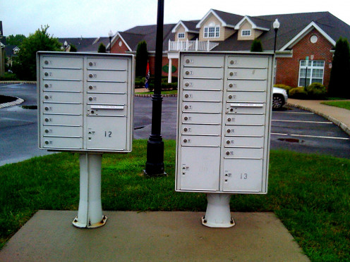 THIS IS A POST BOX MAINTAINED BY THE OWNER OF THE APARTMENT AND HERE EACH APARTMENT IS ALLOTTED A BOX WHERE THE POST MAN KEEPS THE LETTERS WITH A MASTER KEY AND THE APARTMENT DWELLER COLLECTS IT FROM HIS ALLOTTED BOX WITH HIS KEY..
