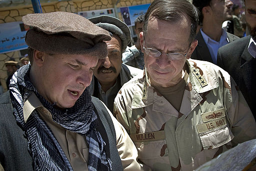 Greg Mortenson shows the locations of future village schools to U.S. Navy Adm. Mike Mullen, chairman of the Joint Chiefs of Staff, at the opening of Pushghar Village Girls School - 60 miles north of Kabul in Panjshir Valley, Afghanistan, 7/15/09.