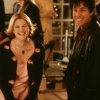 photo credit, New Line Cinema, inc., retrieved at imdb.com,      Drew Barrymore and Adam Sandler in the Wedding Singer