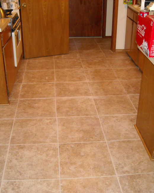 Grout applied to the spaces between the tiles.