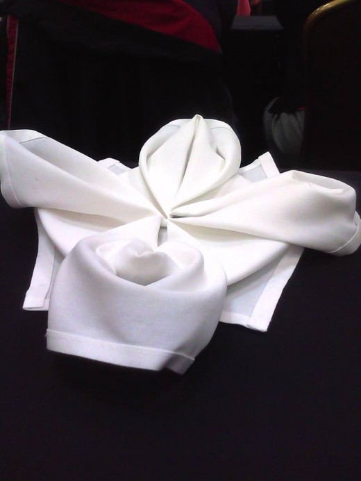 Place a candy or mint in the middle, or even a decorative flower, or placecard
