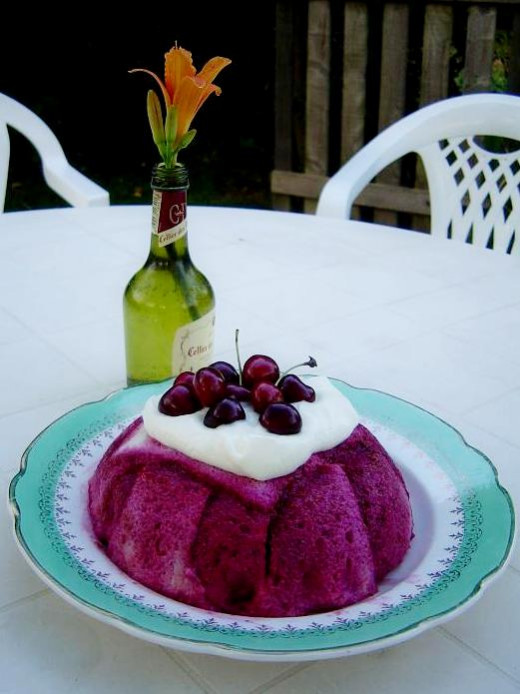 I topped this summer pudding, filled with cherries, red currants and black currants with creme fraiche and cherries.