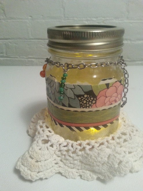 Insert the battery operated votive and enjoy!
