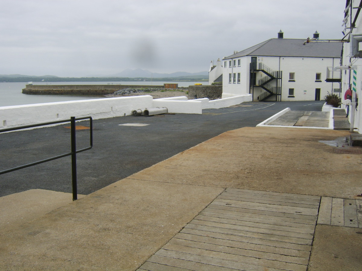 Leaving the vault at Bowmore distillery with the pier and harbour in the distance