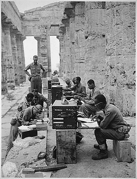 Black WWII Soldiers set up make-shift office between Doric Columns in Greece-cs