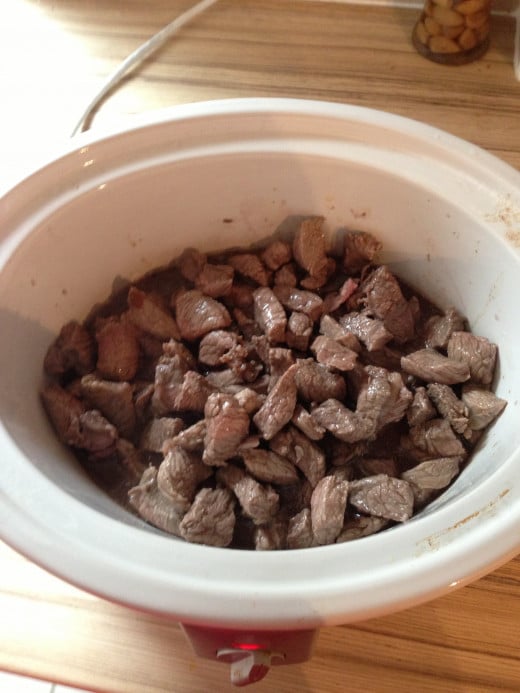 Provencal Beef Stew, first steps, adding beef to the pot