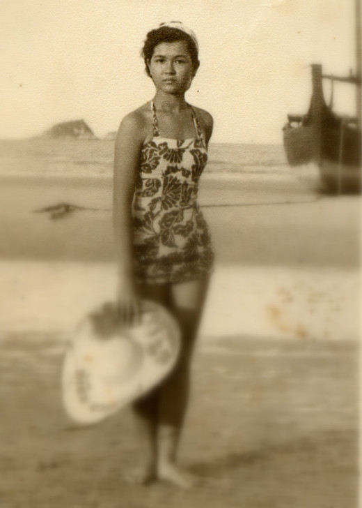 My Mom, Khun Janchai Waralee Pipatpan in Khao Tao. In the background is the island that we paddled around.