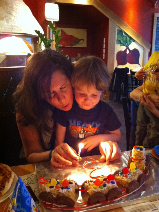 Me and the birthday boy, blowing out the candles.