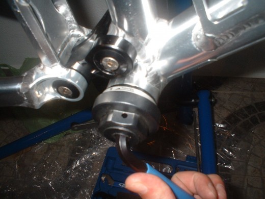 Insert the right sided bottom bracket and tighten it