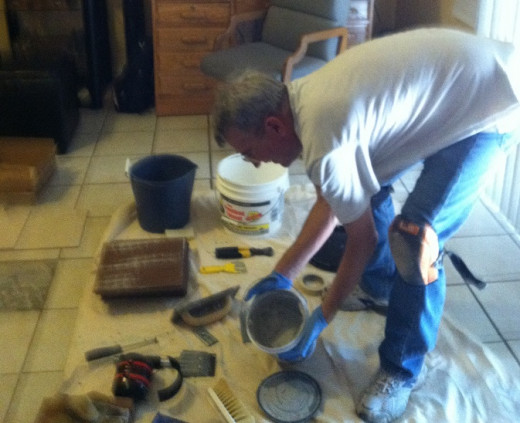 Rubber gloves are essential when working with thin set mortar and grout. They protect the hands from some very caustic chemicals and keep binding agents out of the skin.