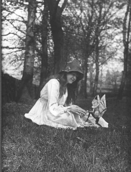 Elsie Wright with a fairy Taken in 1917, first published in 1920 in The Strand Magazine