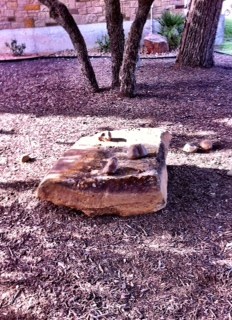 A local shopping center adds large stones to their green area!