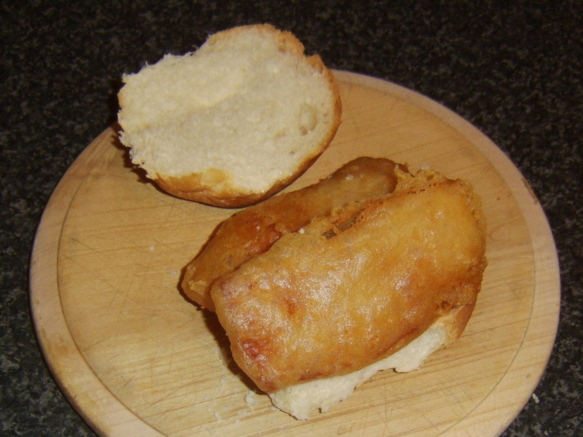 Ham fritters are laid on bottom of bread roll
