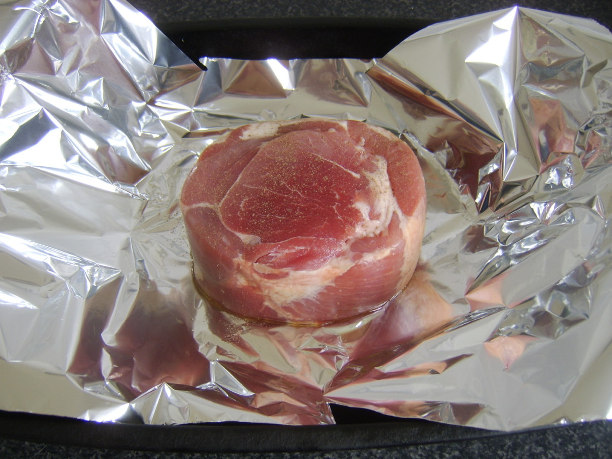 Preparing to roast piece of ham