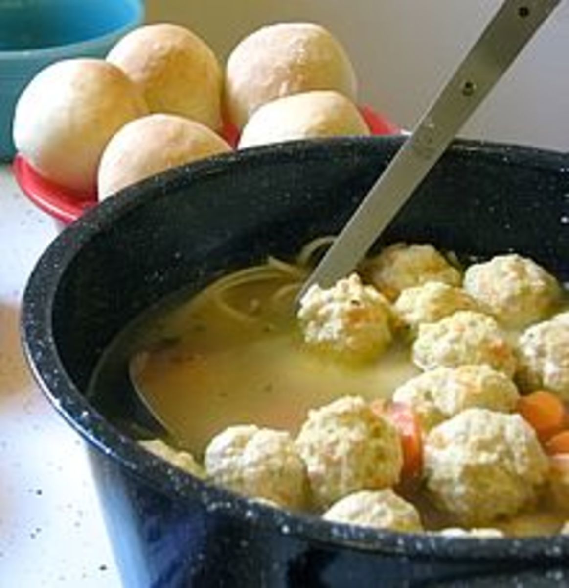Here we have an example of the matzo balls made too small. Plus there is other stuff in the broth, which is okay--but not the way I would do it.