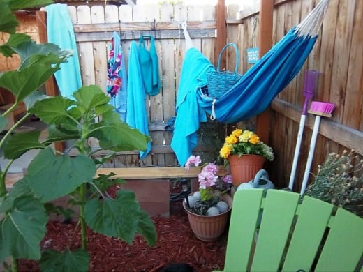 An over the door hanger with several hooks makes a great place to hang those wet towels and bathing suits.
