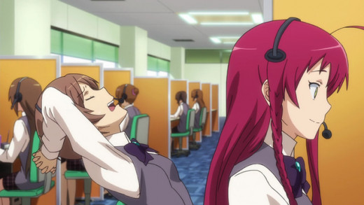 Rika Suzuki (left) and Emi (right) working in their cubicles at the call center.
