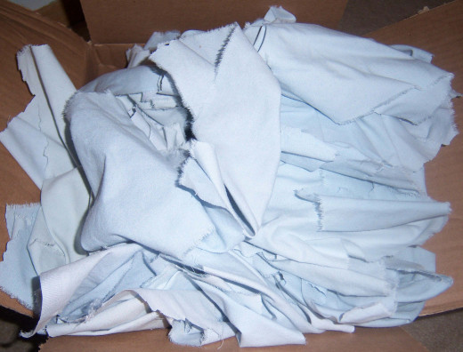 This shredded sheet can be used as stuffing for a handmade toy, cushioning for a package or bedding for critters.