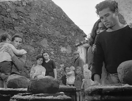 The Malavoglia family in a scene of the film "The Earth Trembles" (Lucchino Visconti,1948), taken from the Verga's novel.