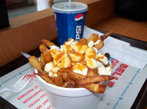 Poutine: french fries, cheese curds, and gravy.