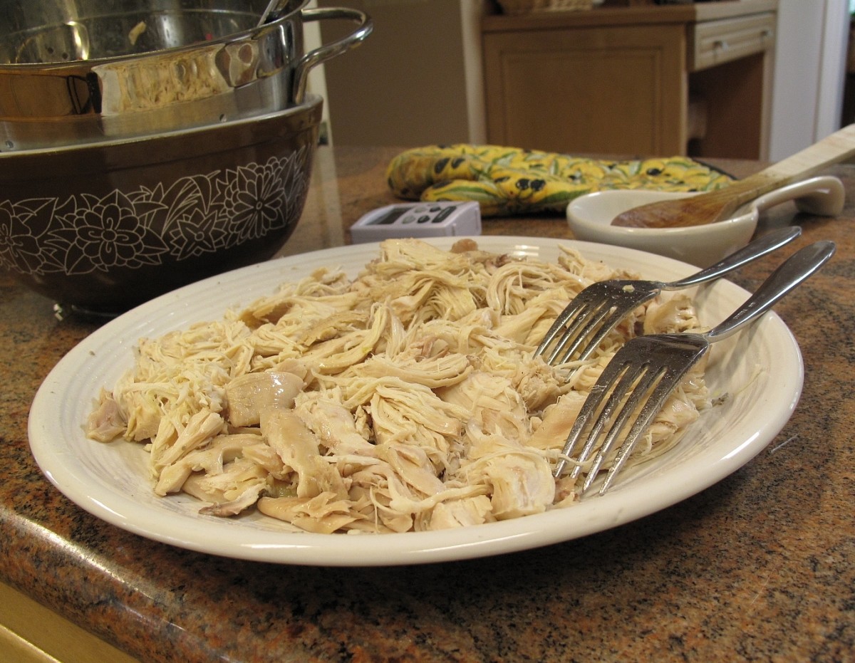 [http://www.flickr.com/photos/27836576@N02/4058814610 - link no longer active] When chicken is cooked just right, you can shred is easily with two forks.