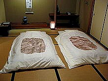Japanese-style futons laid out for sleeping