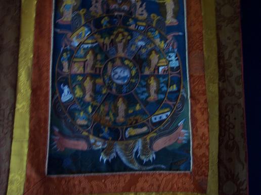 Tradition painting from Tibet called Thangka (map or wheel of life) These artworks were painted by the monks in the Tibetan Monestaries.  This piece was purchased in Nepal about 40 years ago by an acquaintance, I purchased it from her.