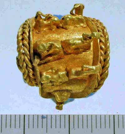 This is the gold earring found at Tel Megiddo