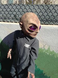 Ari posing in his Alien Costume.
