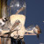 Birds around a bird feeder made from a Coke bottle in Johannesburg, South Africa. Birds around a bird feeder made from a Coke bottle in Johannesburg, South Africa.