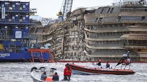 The raised ship showing some of the extreme damage