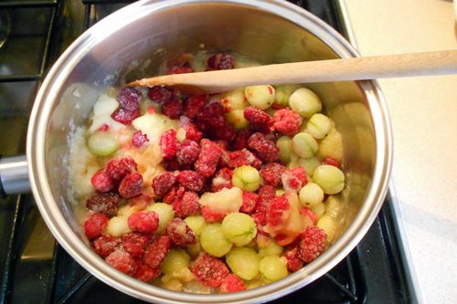 Now add your chosen berries. I am using Raspberries, Tayberries and Gooseberries and they are still frozen - which does not matter a bit!