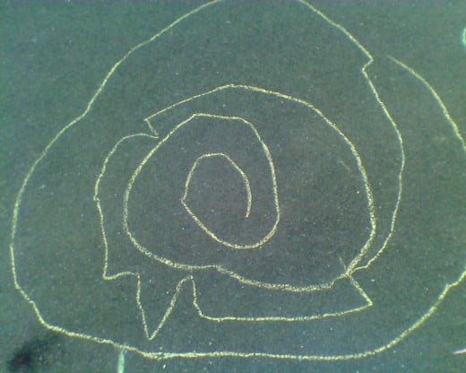 My daughter's chalk rendering of a labyrinth
