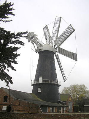 A traditional windmill used to grind corn in a renewable way.  