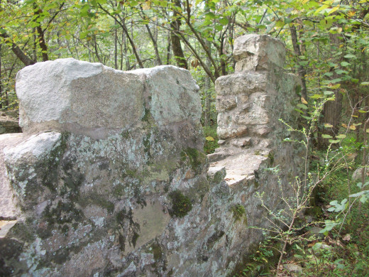 Remains of the original 1790s Robinson Rockhouse, a historic site located within Reedy Creek Nature Preserve