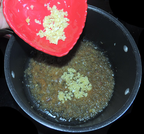add minced garlic, once this sizzles, deglaze with--