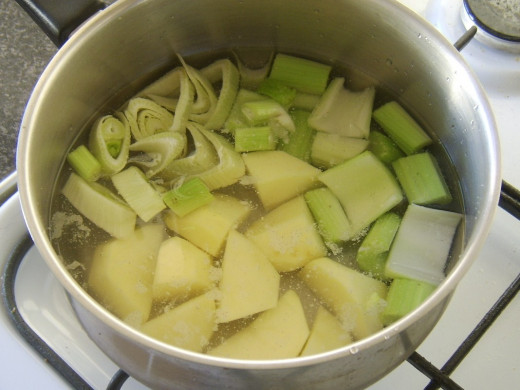 Water is added to cover chopped vegetables