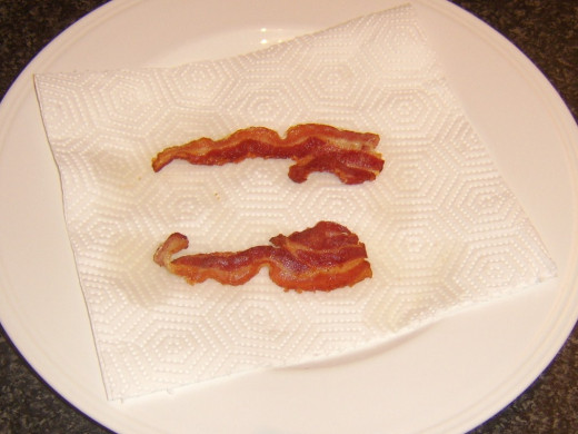 Draining bacon slices for soup garnish