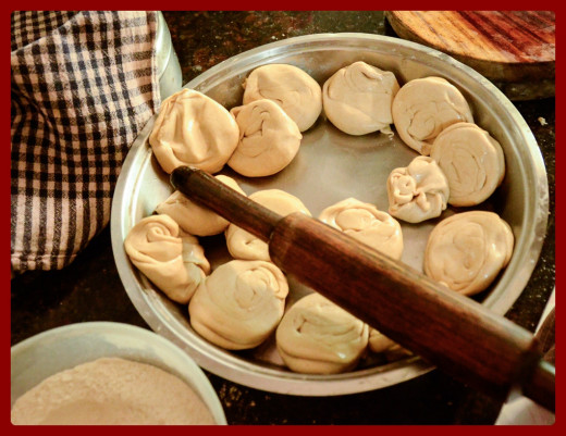 The flat dough balls should have a spiral structure