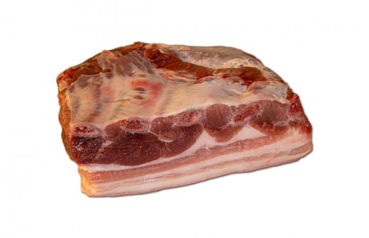 Pork belly as seen at the meat market. It may be marked as "fresh side."