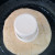 A small container anchoring the center of the tortillas. A small container anchoring the center of the tortillas.