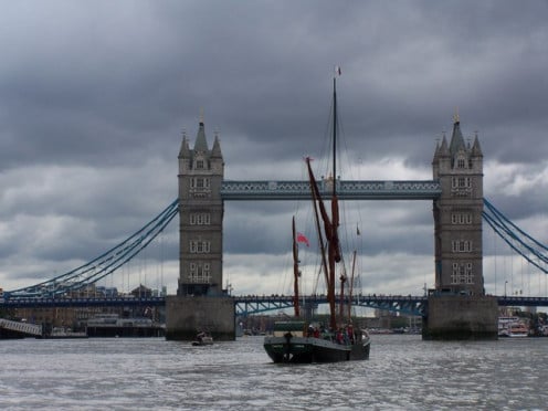 Thames sailing market barge "Thistle" with the Tower Bridge.  